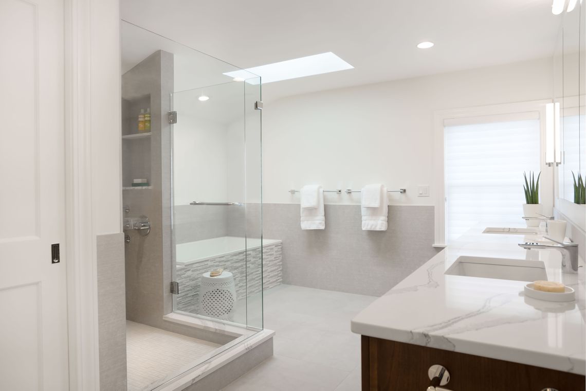 Bathroom renovation, glass door shower, soaking tub, modern bath, the wiese company